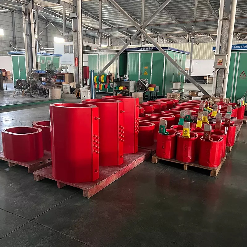 Epoxy Resin Cast Dry-Type Transformer Coils in Power Equipment Manufacturing Workshop Epoxy Resin Cast Dry-Type Transformer Coils in Power Equipment Manufacturing Workshop