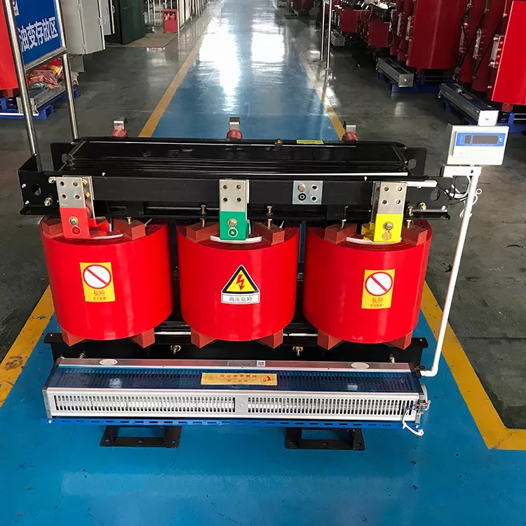 Three-Phase Dry-Type Transformer in Factory Storage Area Three-Phase Dry-Type Transformer in Factory Storage Area